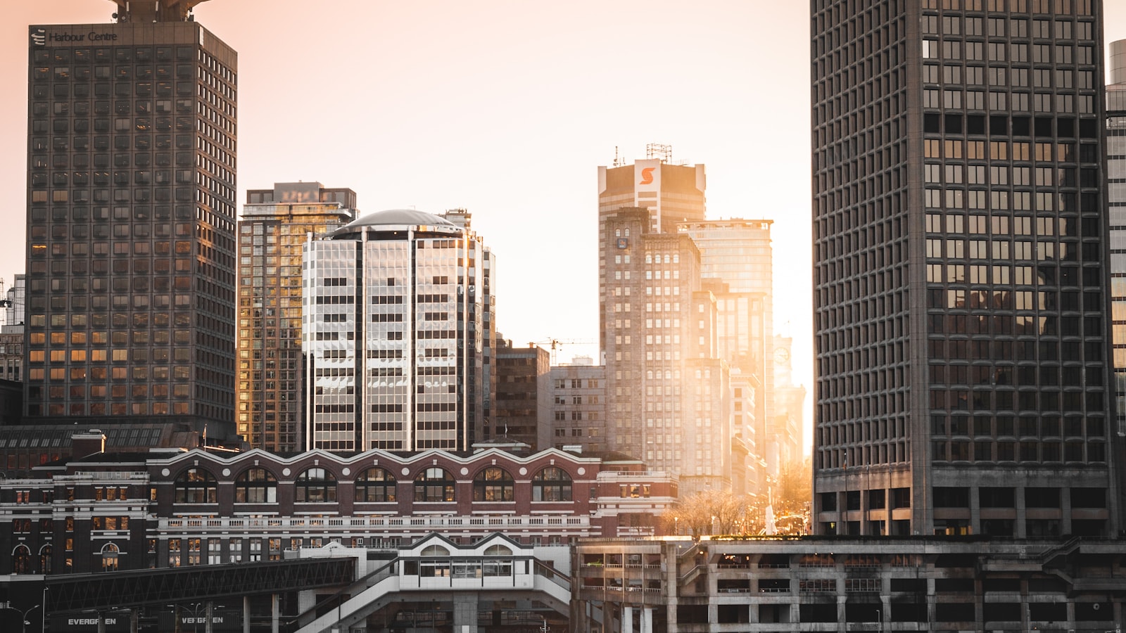 Downtown Vancouver hotel district at sunset for families planning visitor childcare