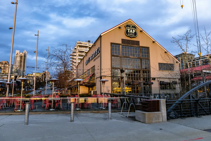 Large Shipyards building with a clock at the top in North Vancouver