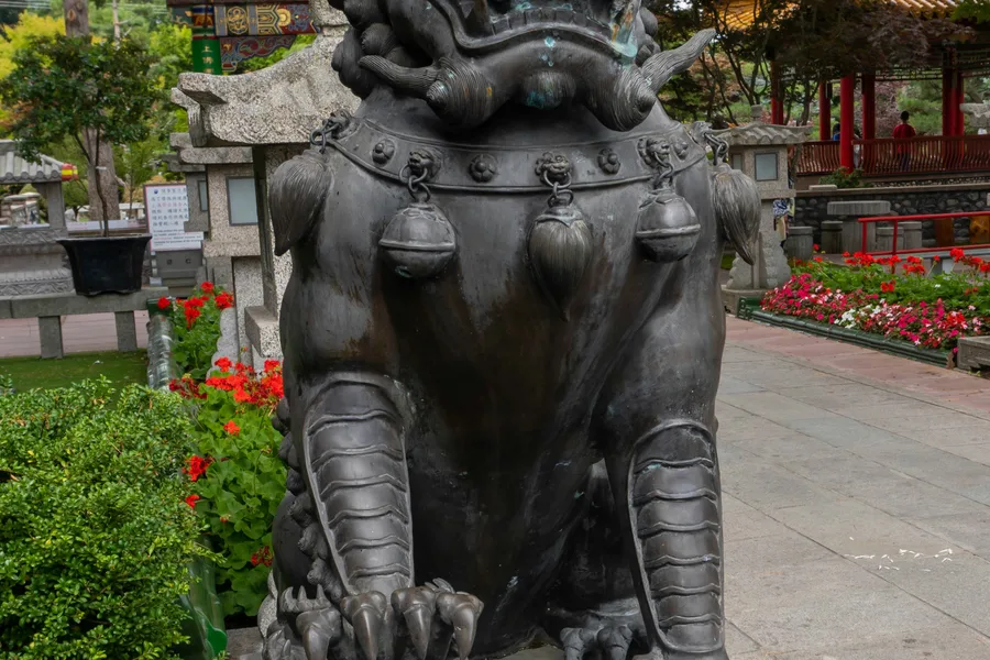 Stone lion statue in a Richmond garden