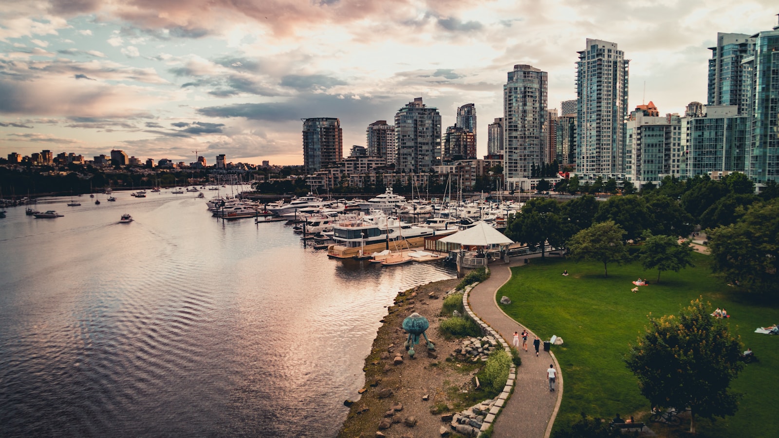Vancouver waterfront with boats and downtown buildings near family-friendly hotels